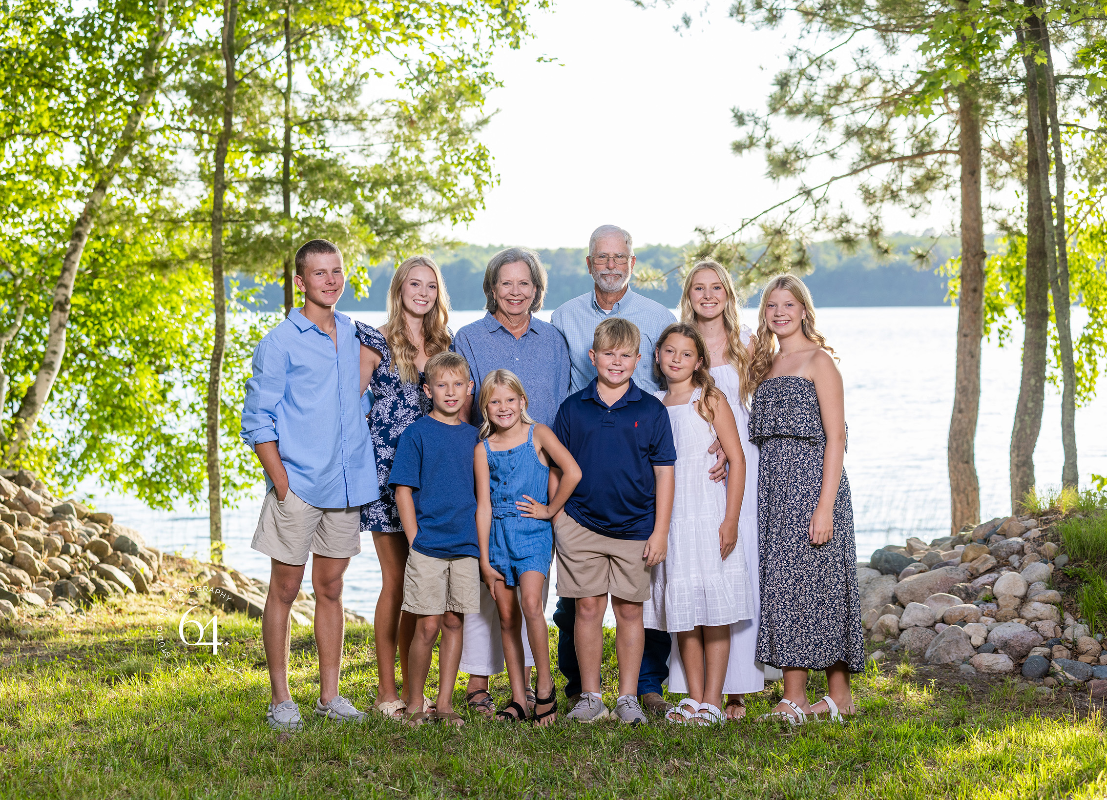 Family Portrait of Grandparents and Grandchildren in front of a Lake in Minnesota during summertime.