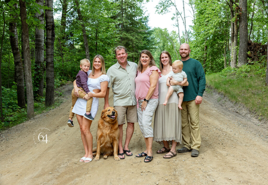 Outdoor extended Family Portraits with Eleventh Crow Wing Akeley MN in the background