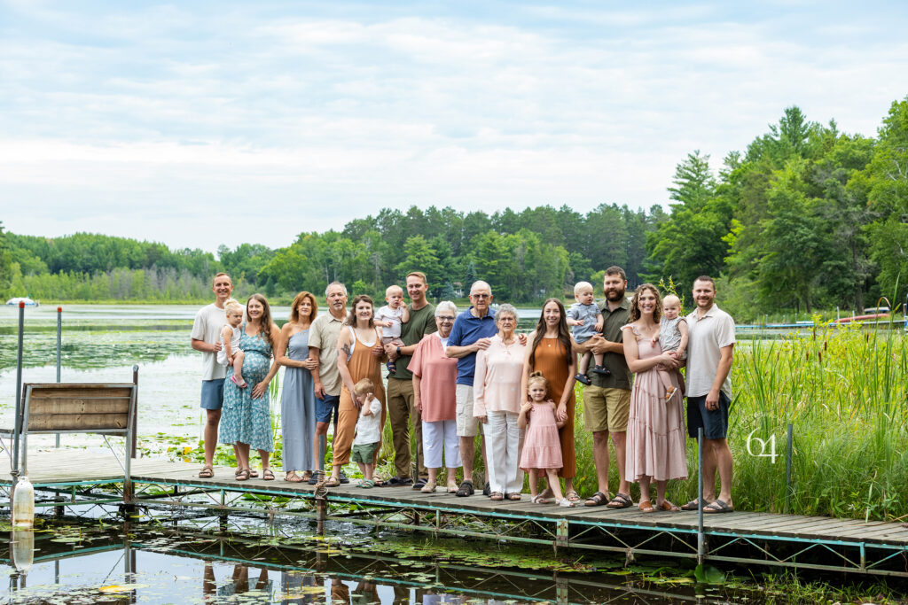 Extended family standing on dock in Northern Minnesota for Family Portraits