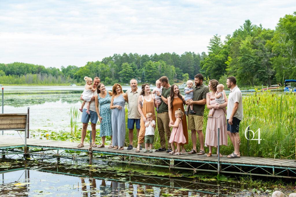 Extended family standing on dock in Northern Minnesota for Family Portraits